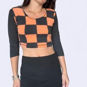 Orange and black checkered quarter sleeve crop top